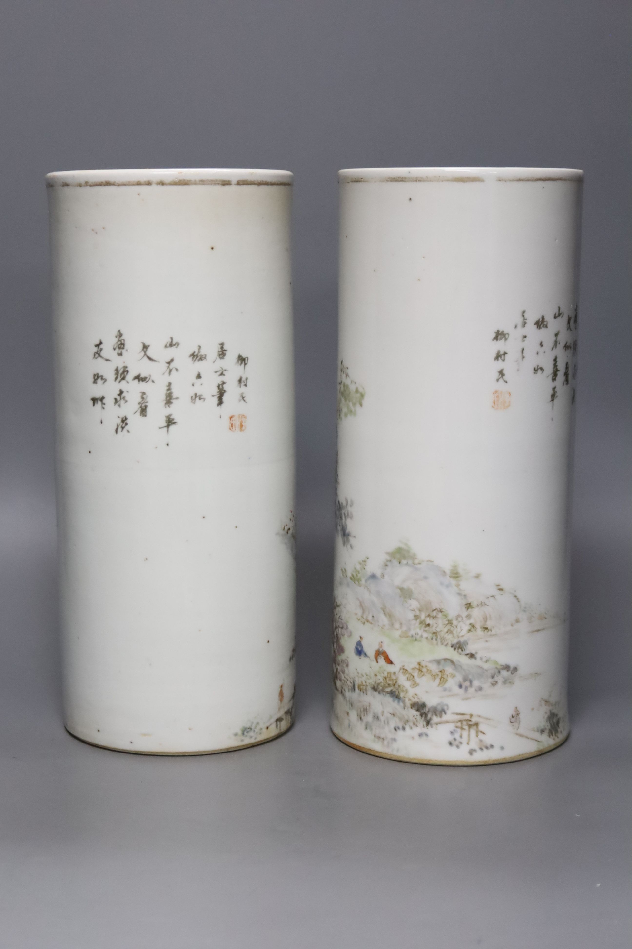 A pair of Chinese cylindrical porcelain vases, height 28cm